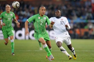 adjid Bougherra of Algeria and Jozy Altidore of USA